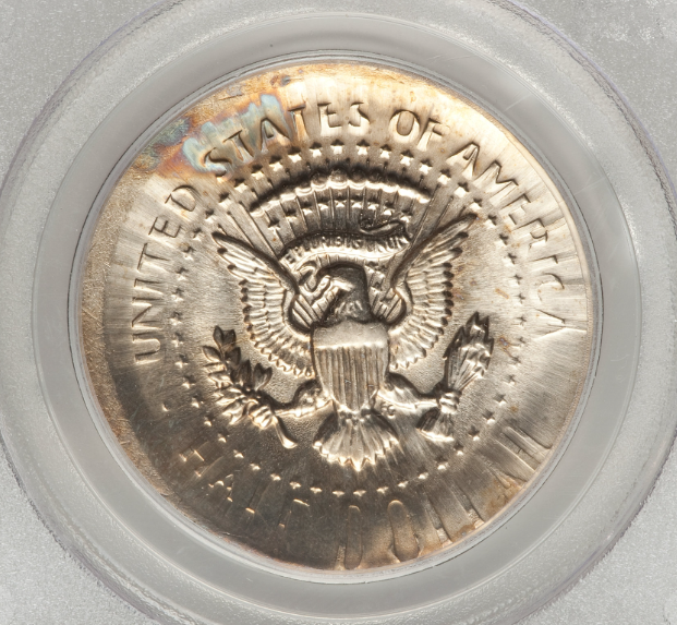 2023 Kennedy half dollar broadstrike error showing spread planchet wider than normal with absent or weak rim