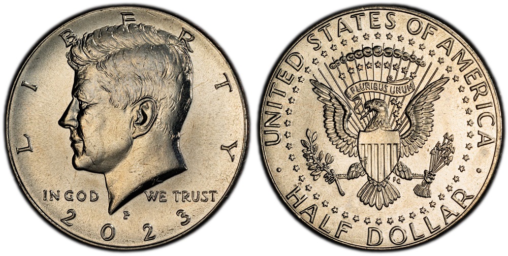 Grading strip showing four 2023 Kennedy half dollars from worn through gem MS67 condition tiers side by side